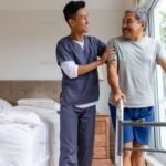 Caregiver_Assisting_Elderly_Man_high_resolution_preview_3236976
